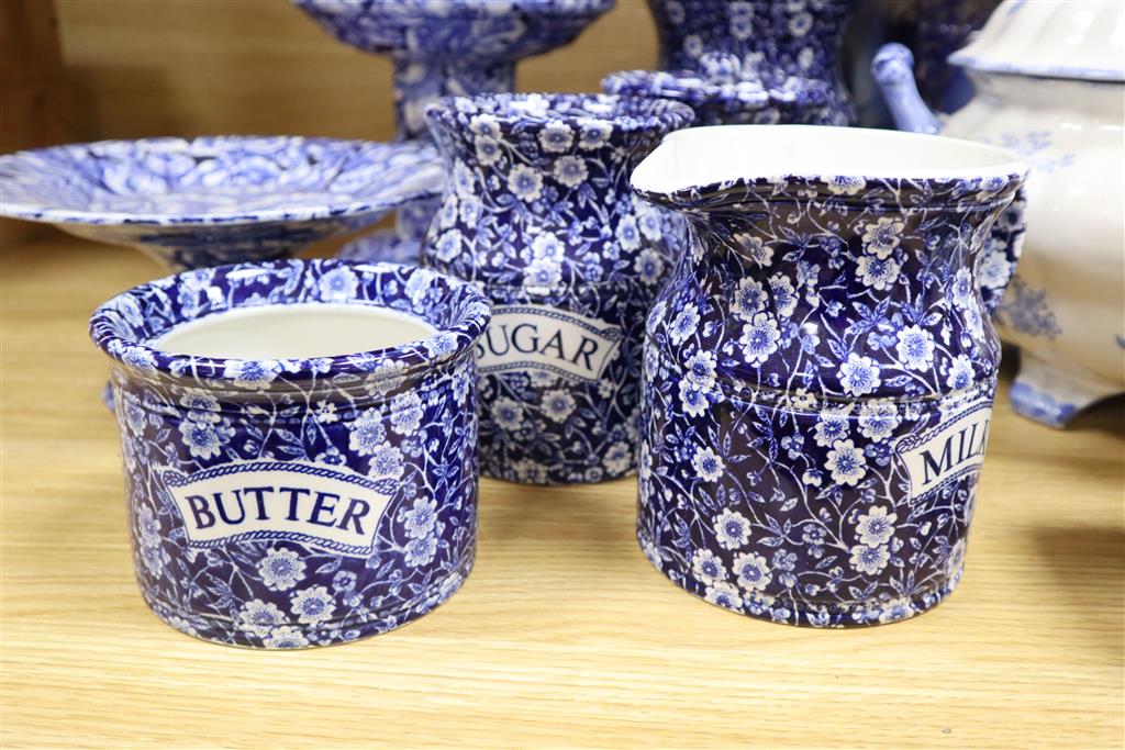 A group of Burleigh ware callico jugs and jars, soup tureen, ladle, butter dish and jardiniere